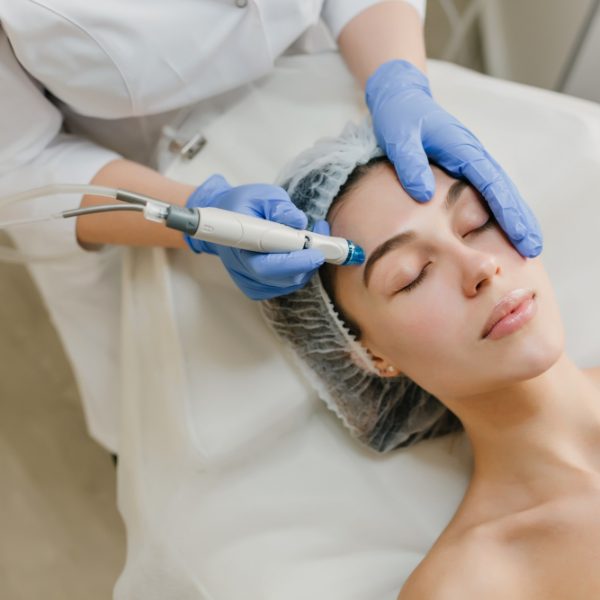 view-from-rejuvenation-beautiful-woman-enjoying-cosmetology-procedures-beauty-salon-dermatology-hands-blue-glows-healthcare-therapy-botox